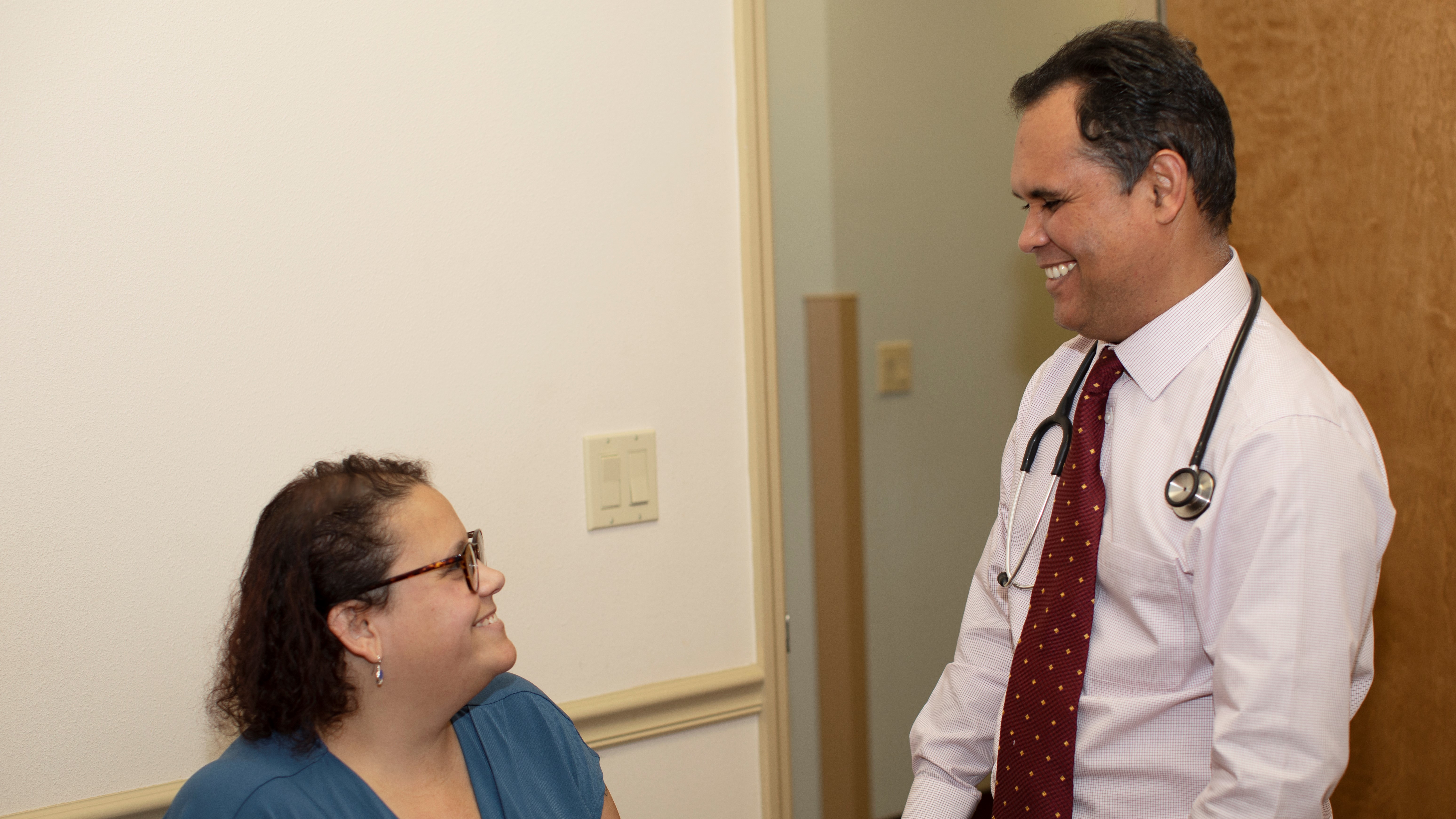 Doctor Santos meeting with a patient